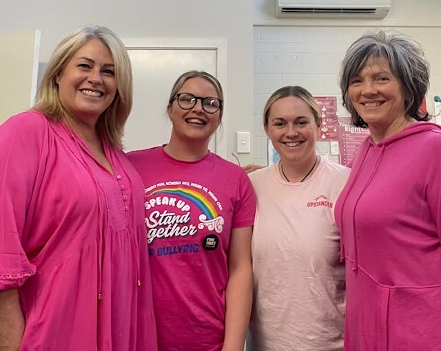 Health Reporoa team wearing pink shirts for Pink Shirt Day anti-bullying campaign